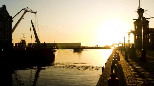 Boat Pulls Harbour Golden Sunrise Waterfront — Wideo stockowe