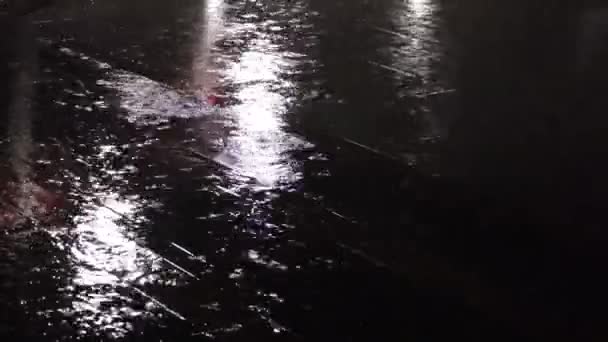 Heavy Rain Hitting Paved Road City Night Abstract Background — стоковое видео