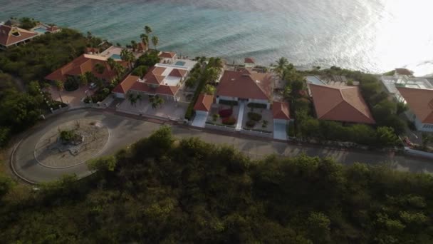 Aerial Trucking Shot Waterfront Houses Tropical Island — Video Stock