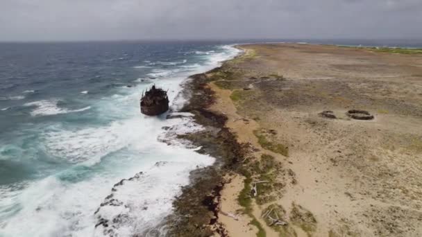 Aerial Fast Orbit Rusty Wreck Standing Top Reef Waves Crashing — Stockvideo