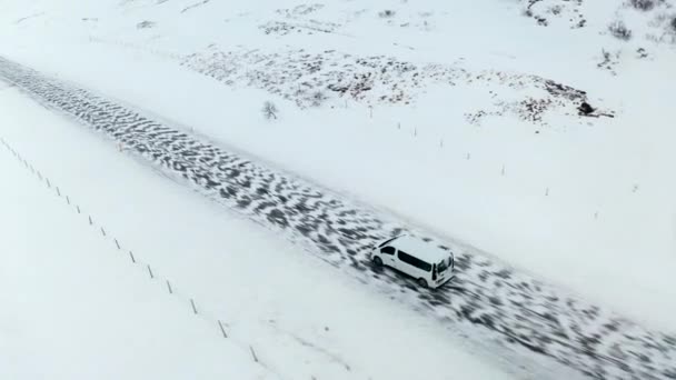 Aerial Tracking Shot Van Tour Snowy Icy Road Iceland Island — Wideo stockowe