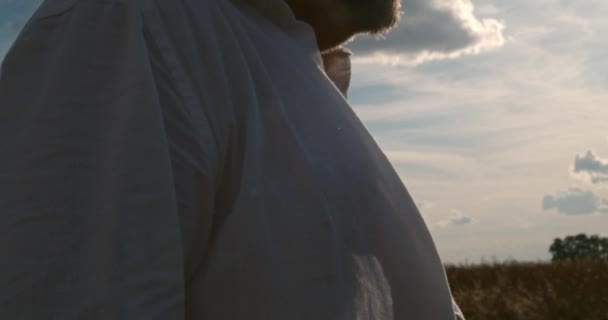 Man White Shirt Stands Middle Landscape His White Shirt Flailing — Stock videók