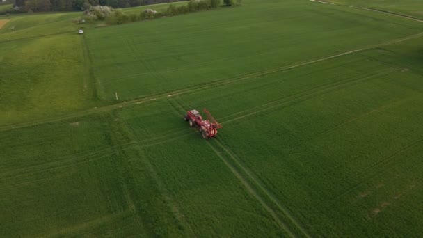 Aerial Footage Tractor Unfolding Its Sprinkler System Huge Green Meadow — Vídeo de Stock