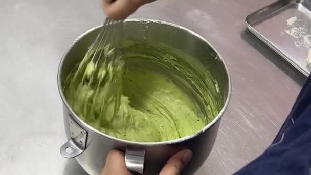 Professional Pastry Chef Hand Mixing Matcha Green Tea Flavor Cake — Stockvideo