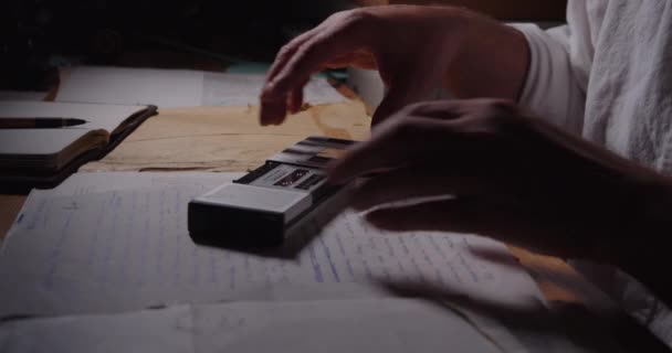 Evening Intimately Lit Study Person Inserts Microcassette Recorder Starts Playing — Stockvideo
