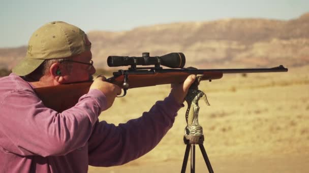 Family Patriarch Carefully Lines Shot Outdoor Target Range Private Property — стоковое видео