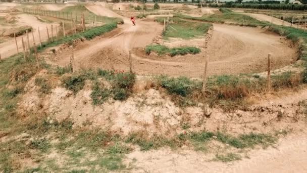 Dirt Bike Approaching Corner Track Slow Motion — Wideo stockowe