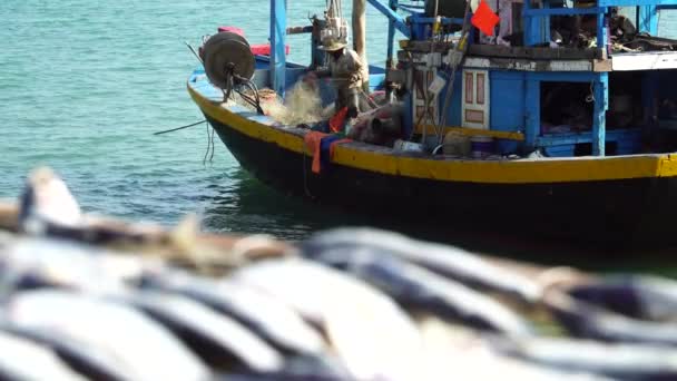 Vietnamese Fishing Vessel Anchored While Fisherman Untangles Net Deck Vietnam — Video Stock