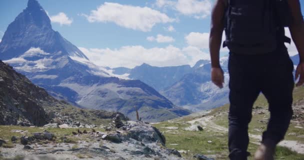 Black Male Backpacker Hiking Matterhorn Mountain Range Switzerland — Wideo stockowe