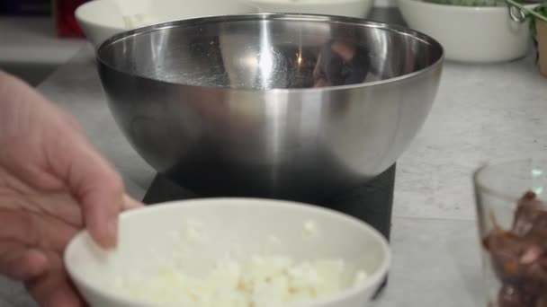 Chef Pours Cottage Cheese Mixing Bowl Closeup Orbiting Shot — Stockvideo