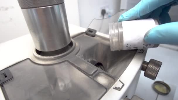 Man Gloves Inserts Powder Milling Machine Research Lab — Stock video