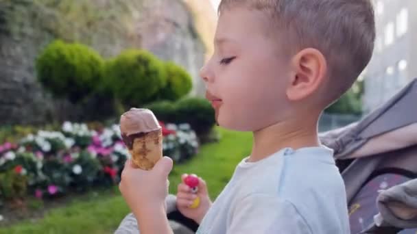 Portrait Caucasian Boy Eating Enjoying Ice Cream Face Smeared Chocolate — Stock video