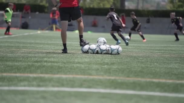 Soccer Coach Looking Out Youth Players Dribbling Ball — 图库视频影像
