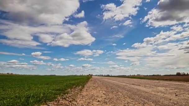 Dynamic Cloudscape Countryside Dirt Road Grassy Field Zoom Out Time — Stock videók