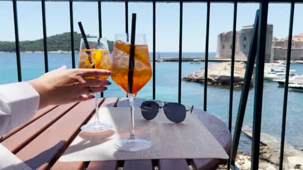 Female Hand Taking Glass Cold Cocktail Aperol Spritz Old Town — Video Stock