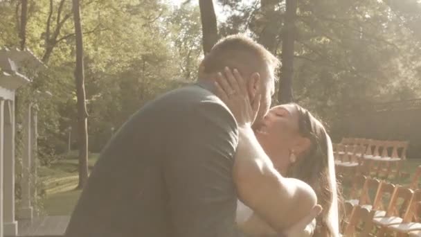 Loving Young Couple Kissing Sunny Scene Wedding Day Marrying Woods — ストック動画