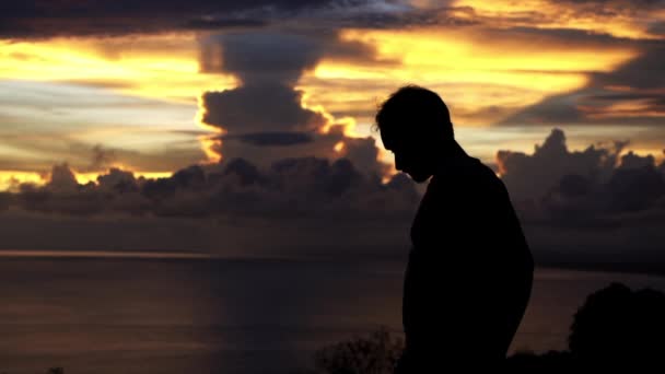 Stunning Sunset Silhouette Athletic Male Model Standing Front Ocean Sea — Stockvideo