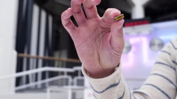 Close White Caucasian Male Hand Showing Small Microchip Camera — Video Stock