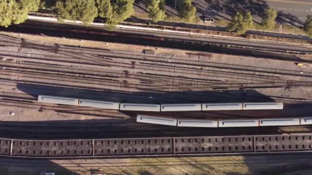 Aerial Overhead Shot Train Slowly Driving Railroad Approaching Platform Buenos — ストック動画