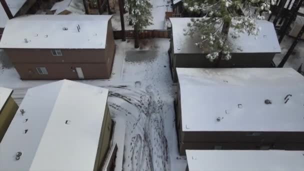 Aerial View Wooden Houses Roof Covered Fresh Snow — Stockvideo