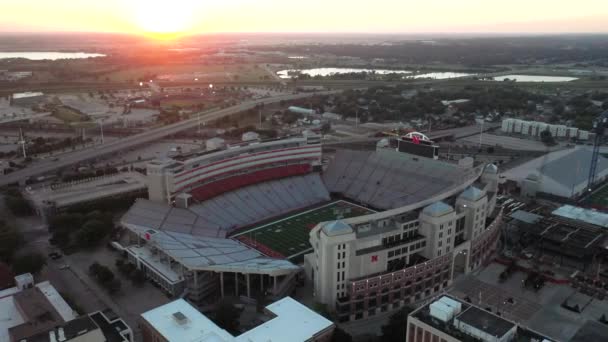 University Nebraska Cornhuskers Memorial Football Stadium Sunset Drone Video Pulling — Stock video