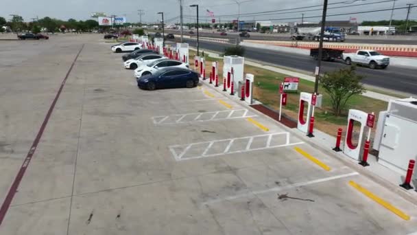 Line Tesla Vehicles Charging Cars All Electric Clean Energy Supercharging — Stock Video