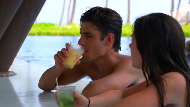 Boy Drinking Pina Colada Girl Sips Mojito Swim Pool Bar — Stock video