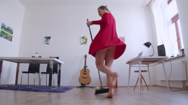 Happy Female Enjoying Housework Cleaning Floor Dancing Low Angle Slider — Stock videók