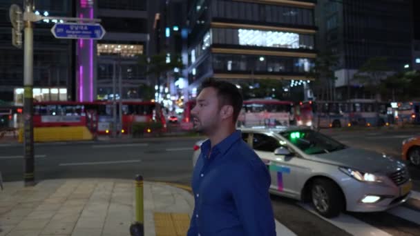 Caucasian Man Walking Sidewalk Gangnam Night Slow Motion — Stock Video