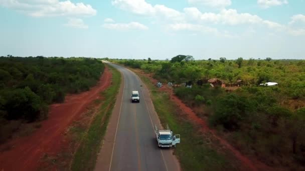 Utility Vehicle Tourists Entering Small Town Kenya East Africa Drone — Video Stock