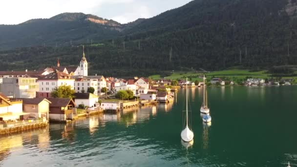 Typical Swiss Village Lake Drone View — Wideo stockowe