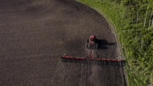 Aerial Shot Tractor Cultivating Large Unplanted Field Agricultural Machines Working — Video