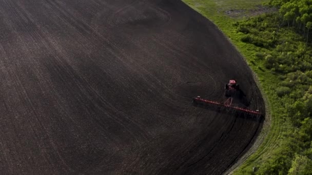 Aerial Shot Tractor Cultivating Large Unplanted Field Agricultural Machines Working — Stockvideo