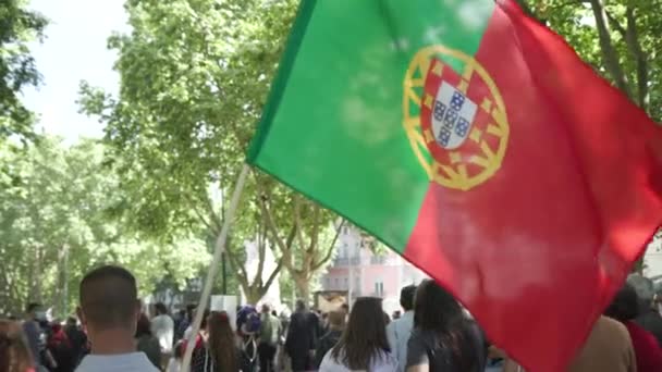 Man Holding Portuguese Flag While Marching Parade Freedom Day Lisbon — Stock videók