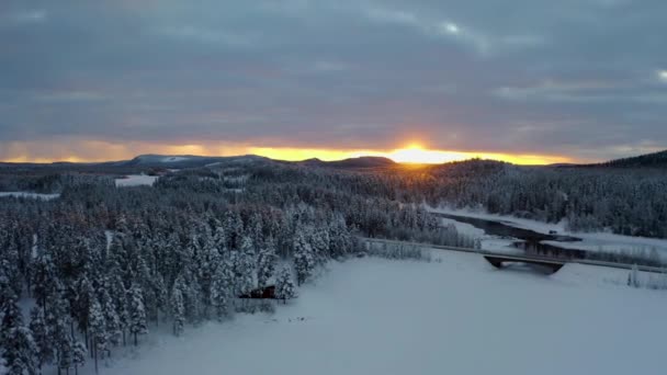 Aerial View Glowing Sunrise Snow Covered Mountains Woodland Trees Ice — Stock video