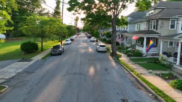Moving Aerial Shot Small Town Street Several Pride Flags American — стокове відео