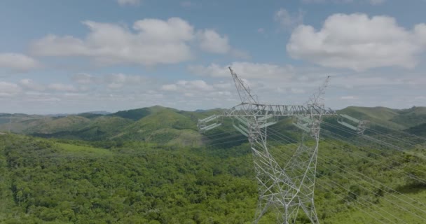 Slow Aerial Flying High Voltage Tower Green Hills Valley Background — Vídeo de Stock