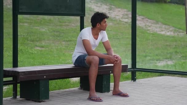 Slow Motion Young Srilankan Man Basic Clothes Slippers Casually Sitting — Wideo stockowe