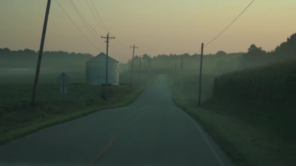 Driving Midwest Backroad Passing Grain Silo Winding Road Farm Fields — ストック動画