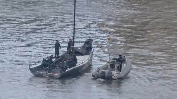 Sailing Crew Finish Lowering Main Inflatable Zodiac Pulls Alongside — Vídeo de Stock