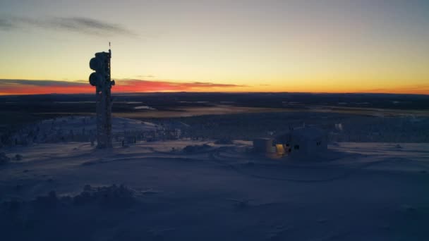 Aerial View Orbiting Small Winter Hilltop Cabin Transmission Tower Surrounded — Stock video