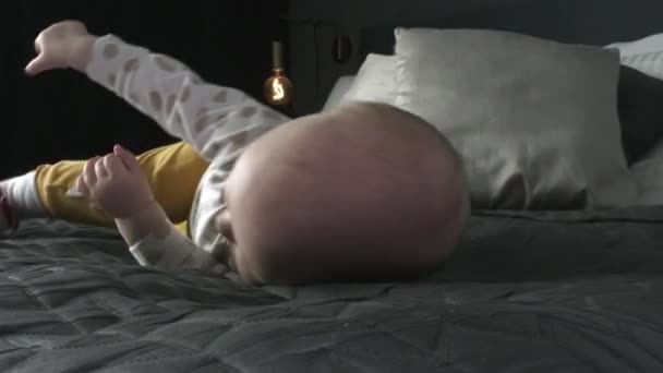 Caucasian Toddler Baby Turns Front King Size Bed Looking Ready — Stok Video