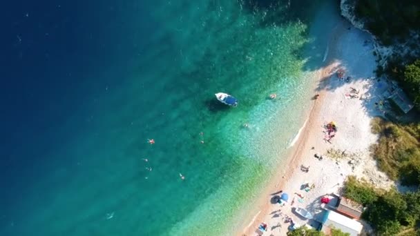 People Swimming Clear Water Sea Summer Croatia Aerial Spin — Stockvideo