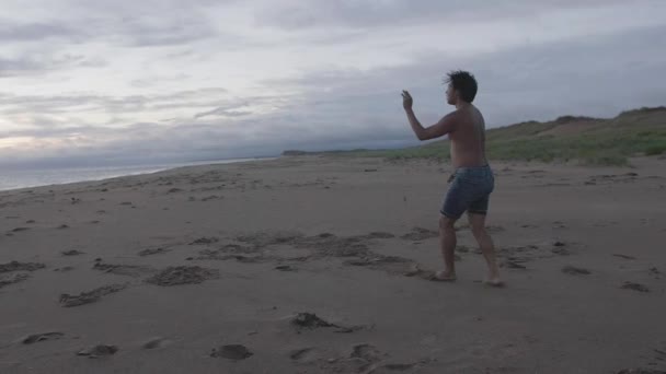 Dancer Backing Beach — Stockvideo