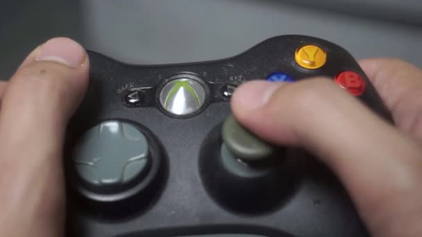 Person Using Controller Background — Stockvideo