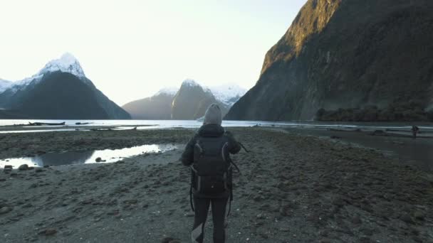 Girl Hiking Gear Walking Shore Milford Sound New Zealand — Stockvideo