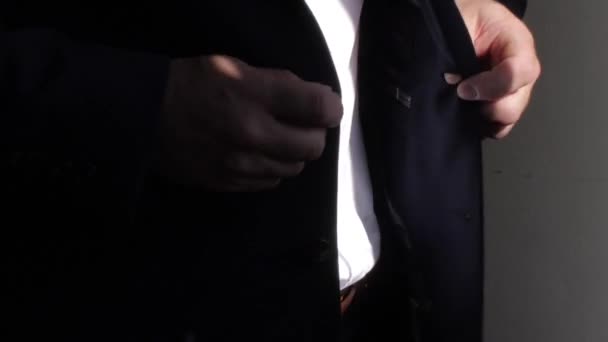 Close Male Hands Doing Two Button Tuxedo Suit Jacket Preparation — ストック動画
