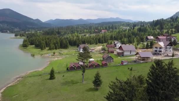 Aerial Take Shot Lake Edge Ever Green Trees Building Site — Video