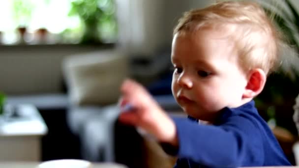 Cute Caucasian Baby Boy Sitting Table His Mum Slider Moving — Stock videók