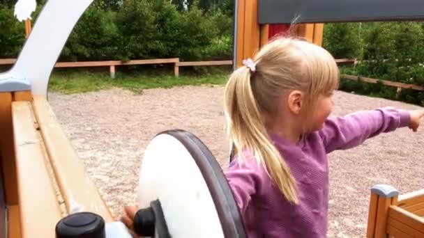 Healthy Caucasian Girl Blond Ponytail Playing Park Playground Chewing Gum — Stock Video